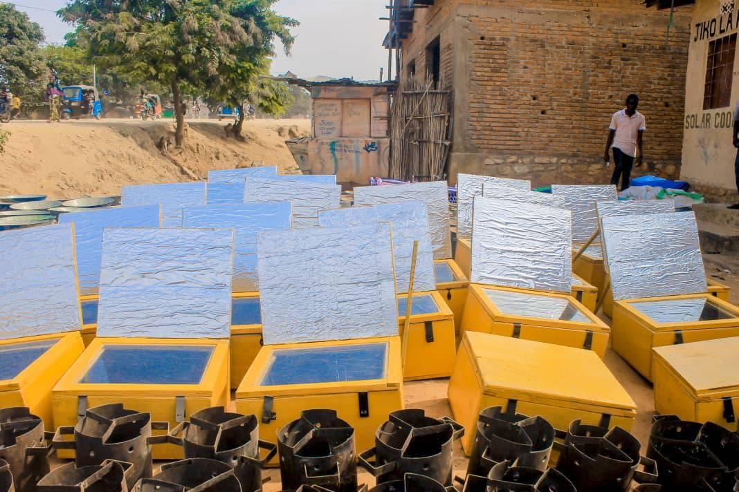 Box solar cookers and clean cookstoves ready for distribution