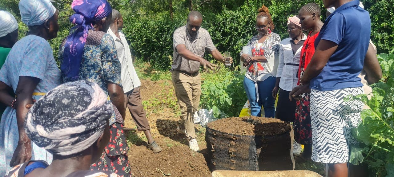 Composting training with a widows' chama group