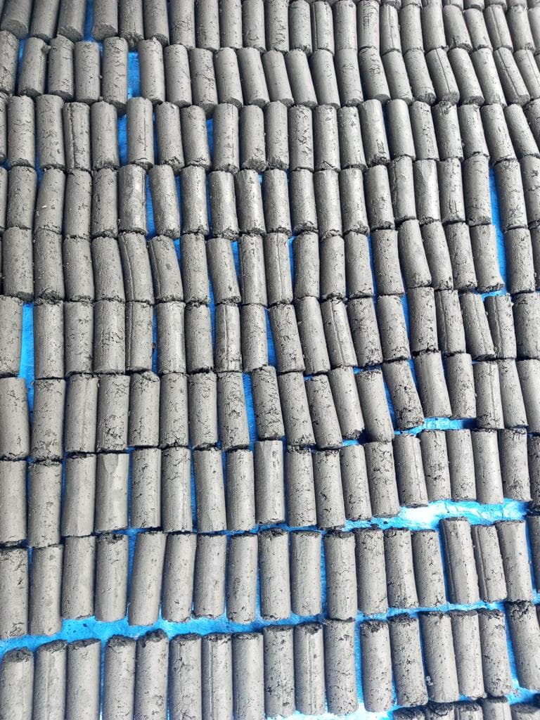 Briquette production in progress
